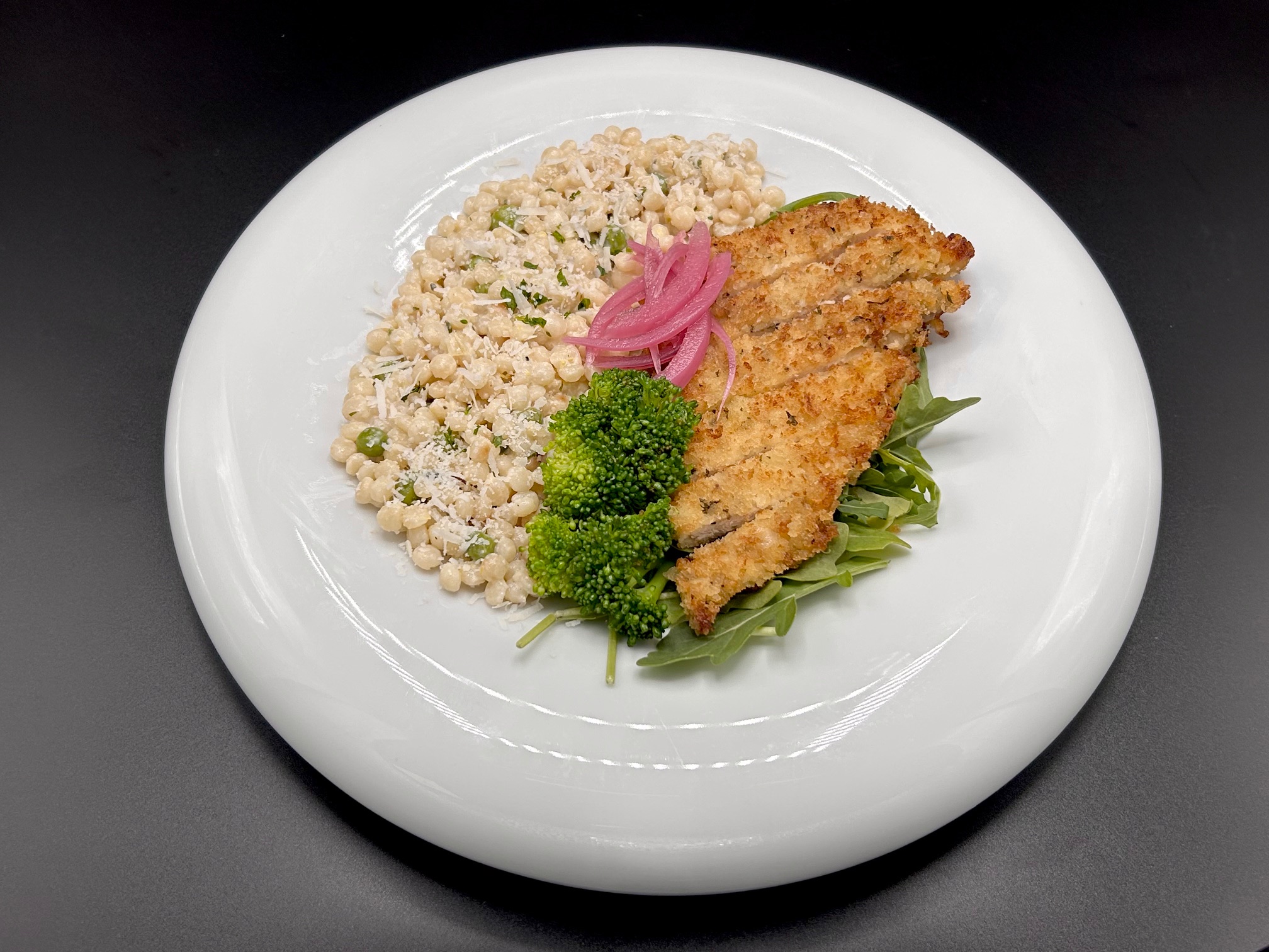 Creamy Couscous Risotto with Chicken Milanese - PLated